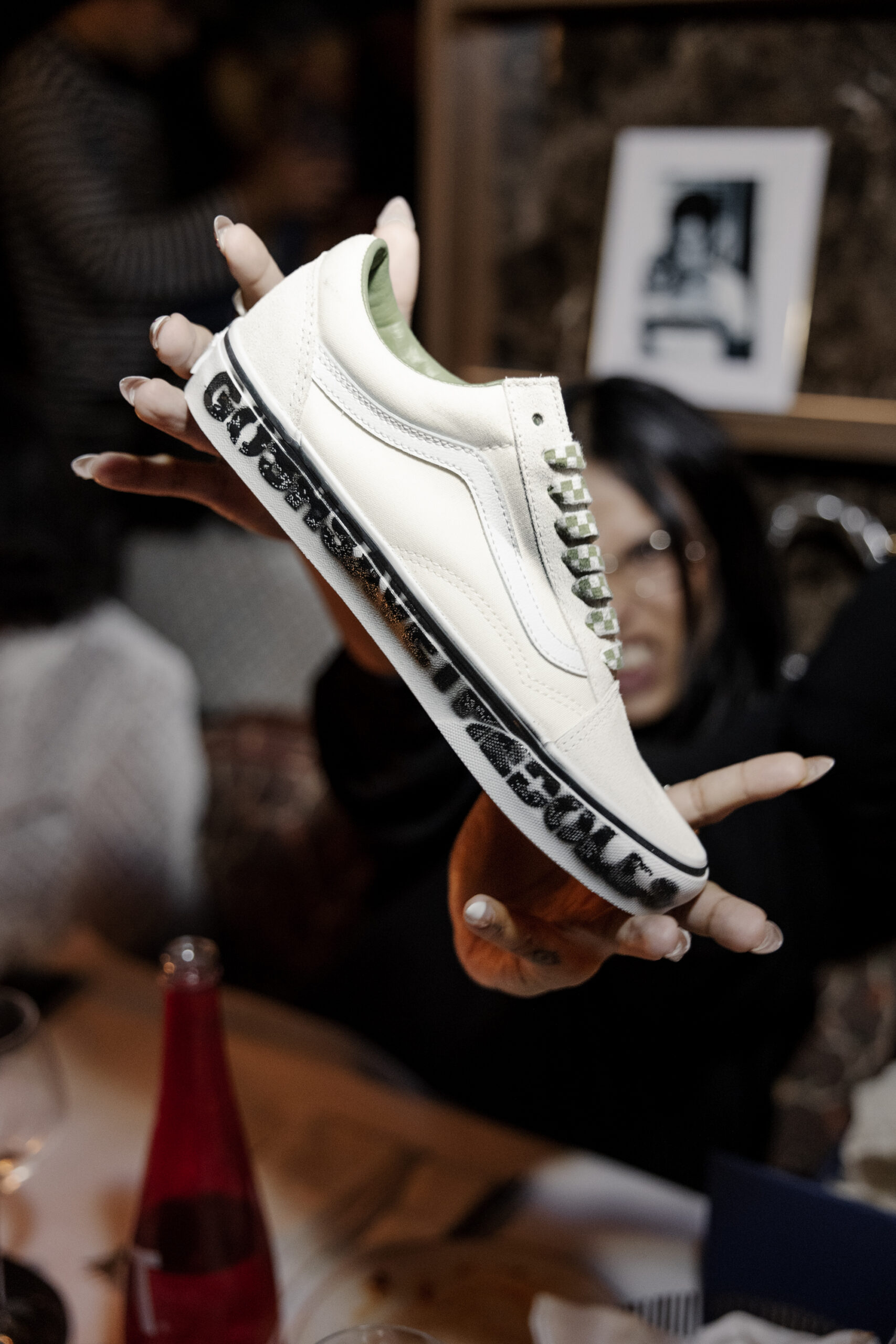 vans capsule — cream sneaker with stencil text